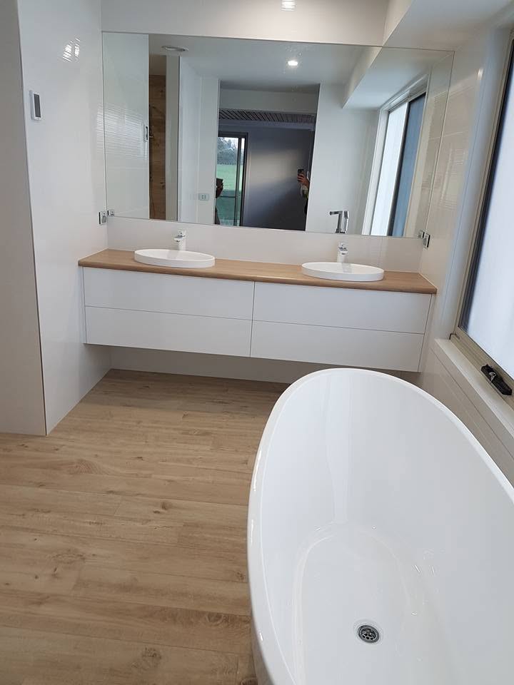 A newly plumbed double vanity in a bathroom renovation